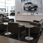 Freedom KIA Dealership-Lounge chairs and side tables- designed by Omega Commercial Interiors